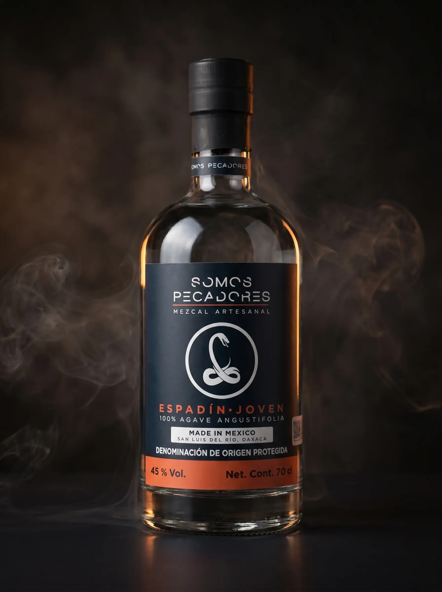 Somos Pecadores Espadín Joven mezcal bottle rising from smoke against a dark backdrop